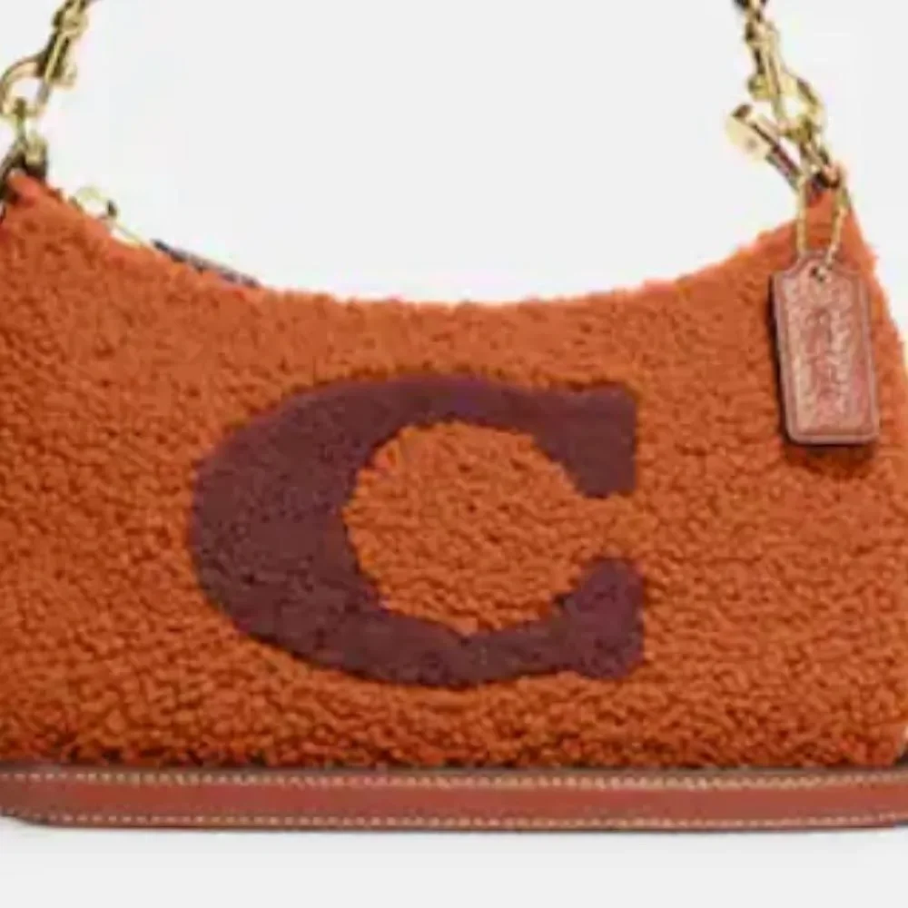NWT Coach GENUINE SHEARLING teri shoulder bag with coach motif NEW WITH TAG​…